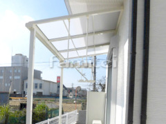 洗濯干し屋根 LIXILスピーネ1階 タイルデッキ グレイスランド300角